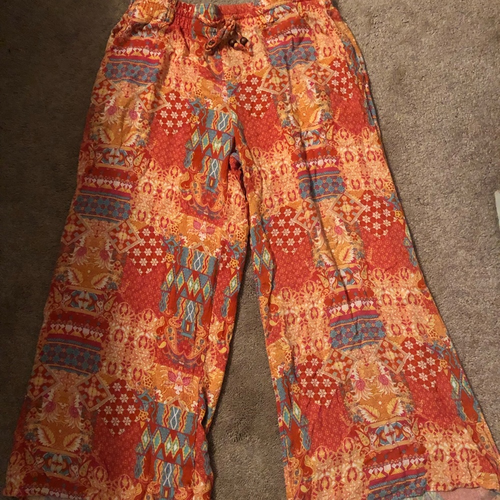 These fun gaucho pants are a mix of turquoise, yellow, orange and white.
